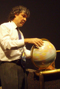 Dr. Jeff Goldstein demonstrates the Earth's rotation as he also spins stories about space science.